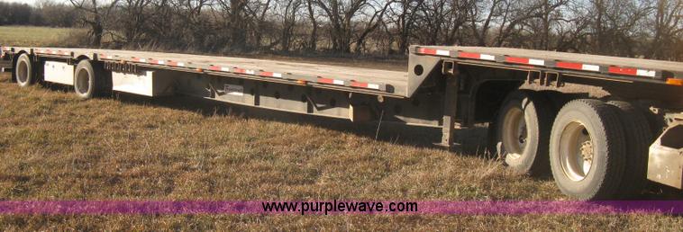 image for item B8486 2004 Transcraft step deck flatbed trailer