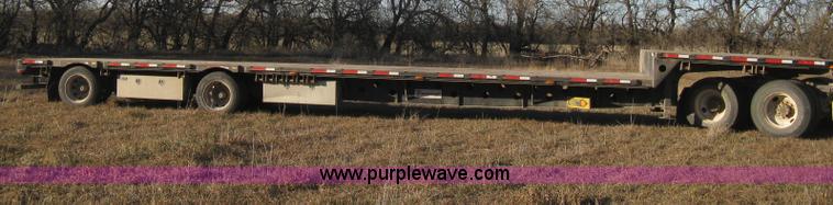image for item B8486 2004 Transcraft step deck flatbed trailer