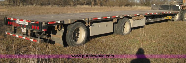 image for item B8486 2004 Transcraft step deck flatbed trailer