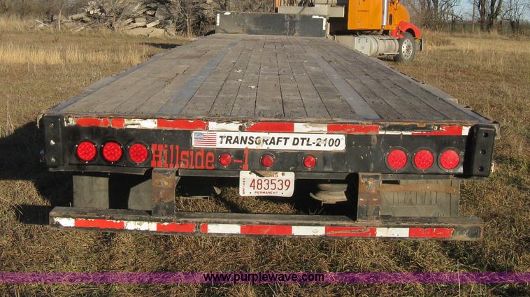 image for item B8486 2004 Transcraft step deck flatbed trailer