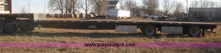 image for item B8486 2004 Transcraft step deck flatbed trailer