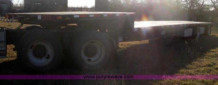 image for item B8486 2004 Transcraft step deck flatbed trailer