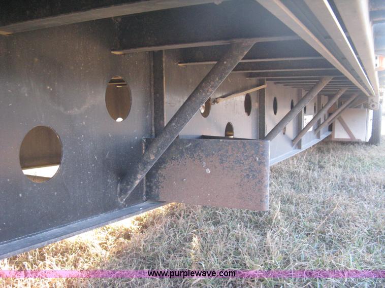 image for item B8486 2004 Transcraft step deck flatbed trailer