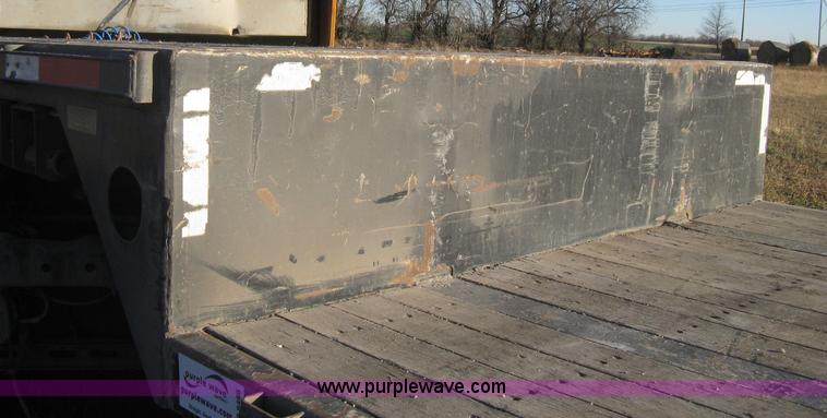 image for item B8486 2004 Transcraft step deck flatbed trailer