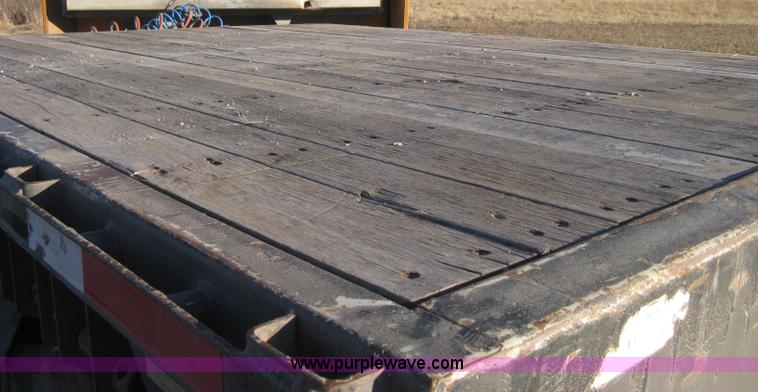 image for item B8486 2004 Transcraft step deck flatbed trailer