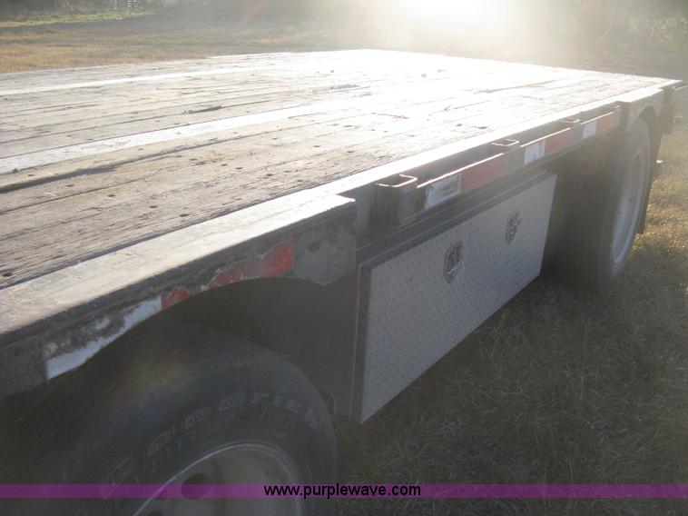 image for item B8486 2004 Transcraft step deck flatbed trailer