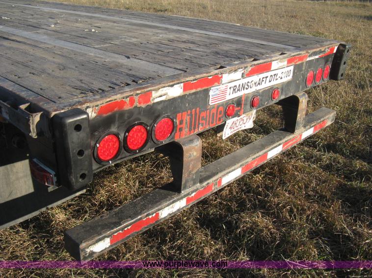 image for item B8486 2004 Transcraft step deck flatbed trailer