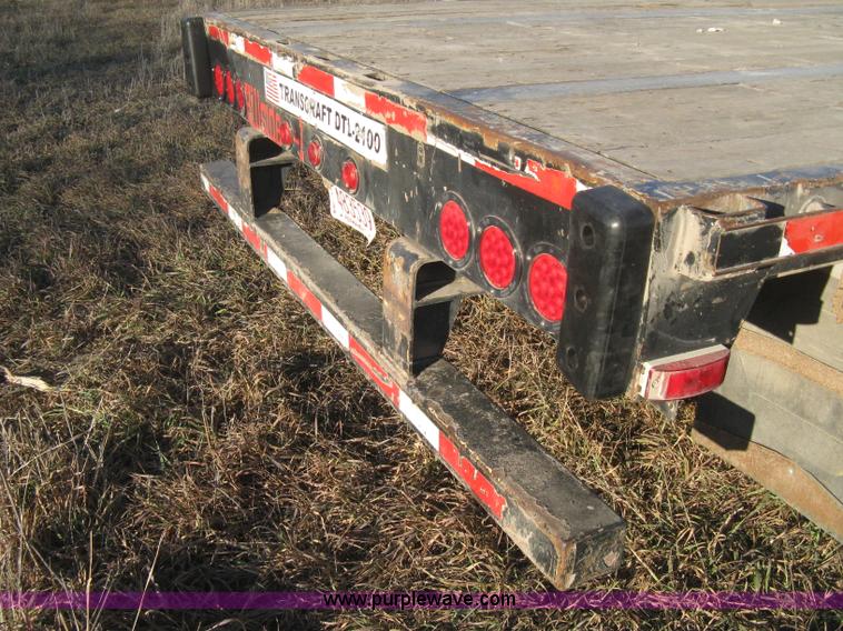 image for item B8486 2004 Transcraft step deck flatbed trailer
