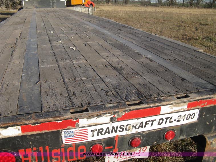 image for item B8486 2004 Transcraft step deck flatbed trailer