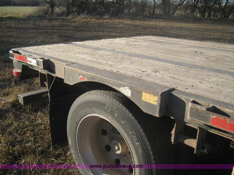 image for item B8486 2004 Transcraft step deck flatbed trailer