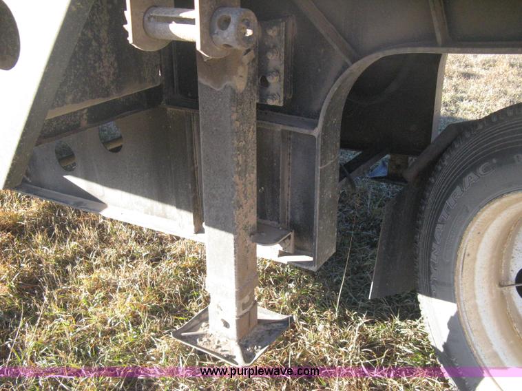 image for item B8486 2004 Transcraft step deck flatbed trailer