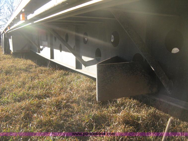 image for item B8486 2004 Transcraft step deck flatbed trailer