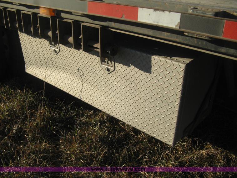 image for item B8486 2004 Transcraft step deck flatbed trailer