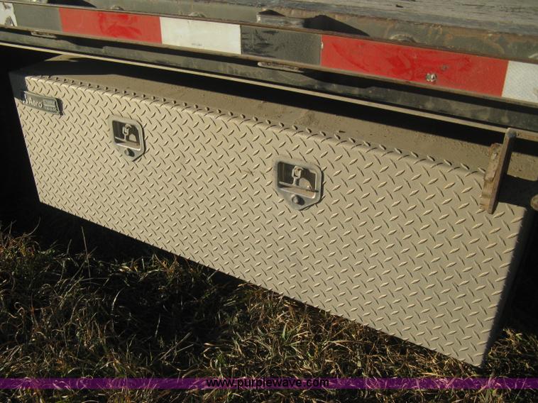 image for item B8486 2004 Transcraft step deck flatbed trailer