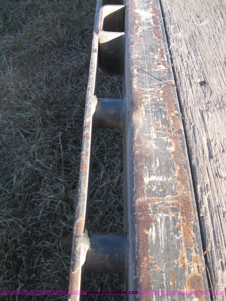 image for item B8486 2004 Transcraft step deck flatbed trailer