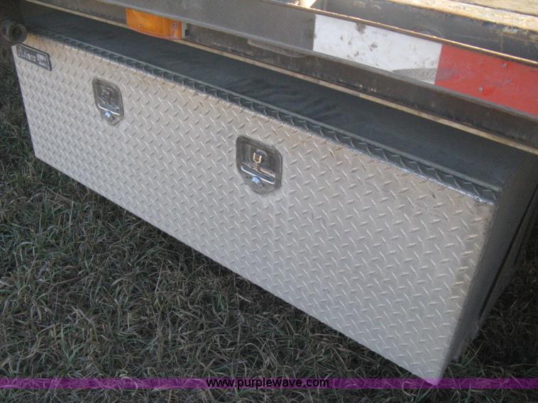image for item B8486 2004 Transcraft step deck flatbed trailer