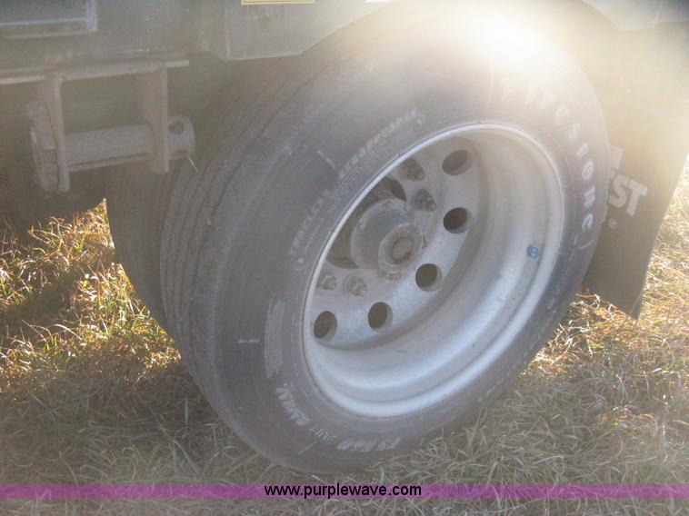 image for item B8486 2004 Transcraft step deck flatbed trailer