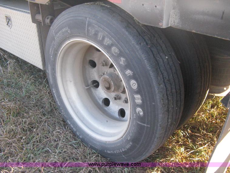 image for item B8486 2004 Transcraft step deck flatbed trailer