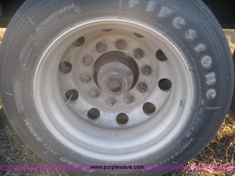 image for item B8486 2004 Transcraft step deck flatbed trailer