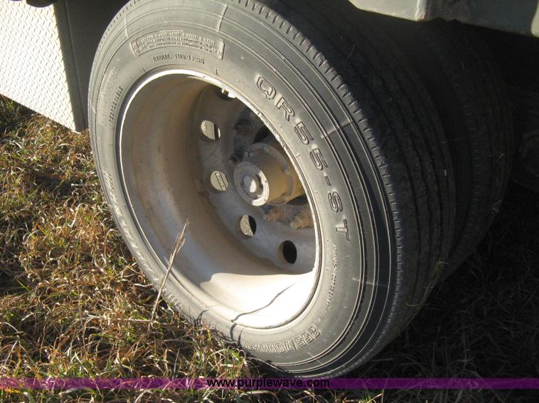 image for item B8486 2004 Transcraft step deck flatbed trailer