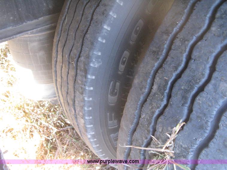 image for item B8486 2004 Transcraft step deck flatbed trailer