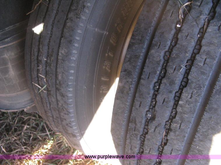 image for item B8486 2004 Transcraft step deck flatbed trailer