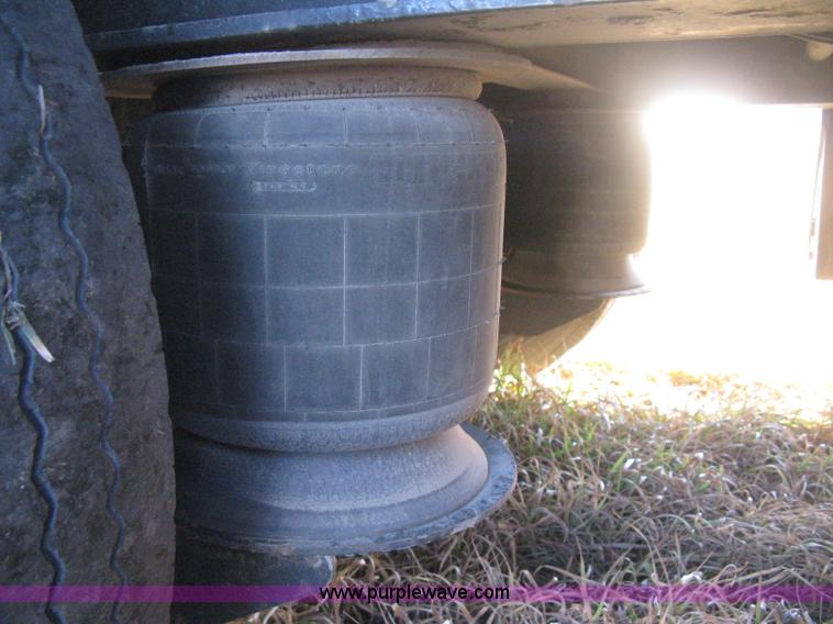 image for item B8486 2004 Transcraft step deck flatbed trailer