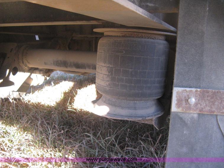 image for item B8486 2004 Transcraft step deck flatbed trailer