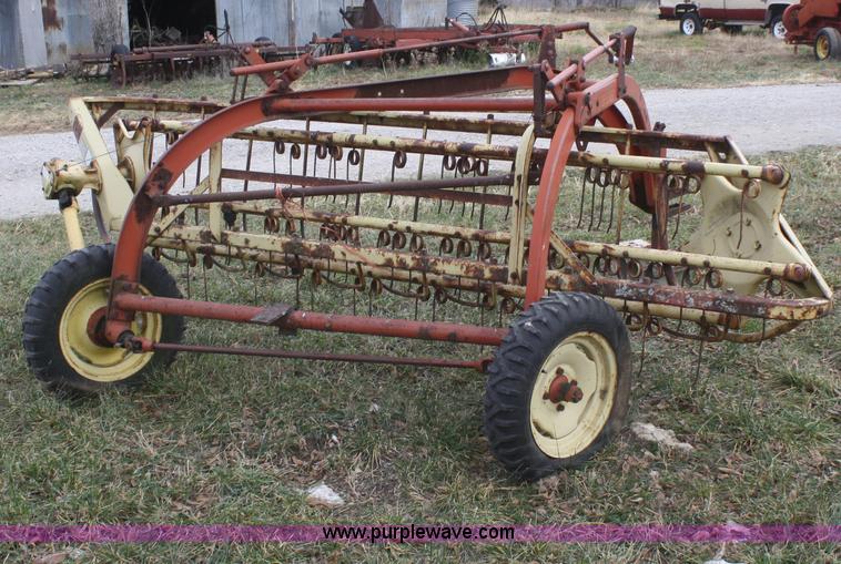 image for item F2908 New Holland 250 ground driven rake