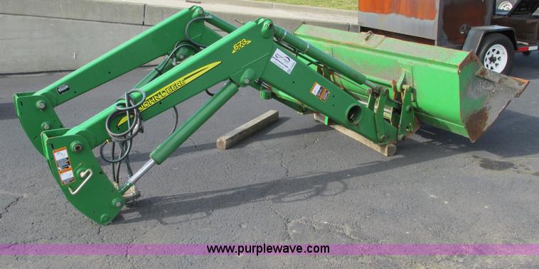 image for item F4056 2005 John Deere 673 loader attachment
