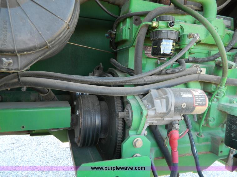 image for item G7590 1998 John Deere 4890 swather