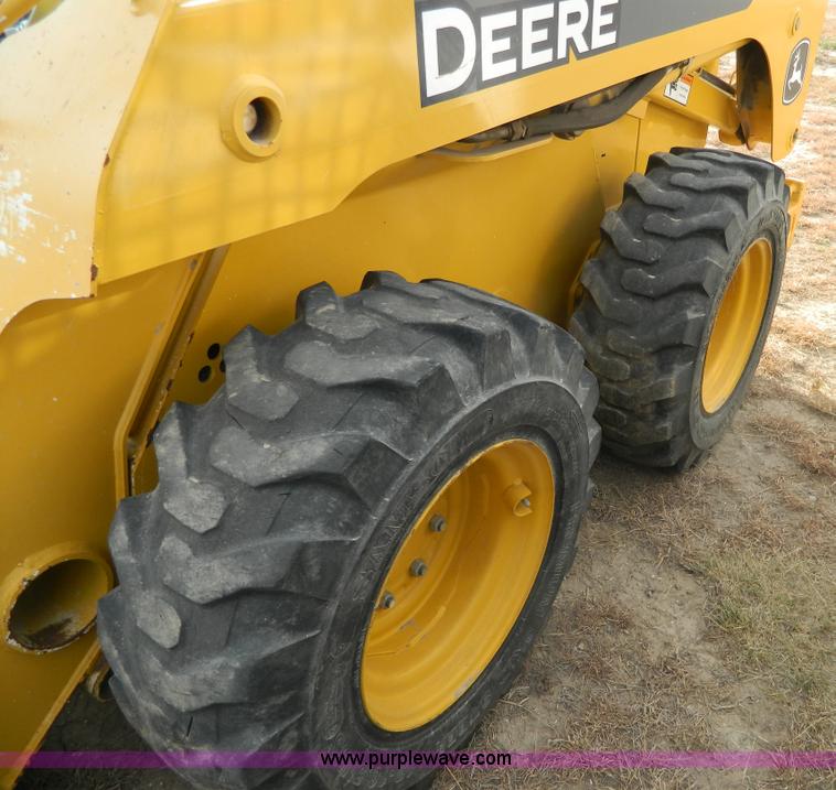 image for item G7666 2009 John Deere 320 skid steer