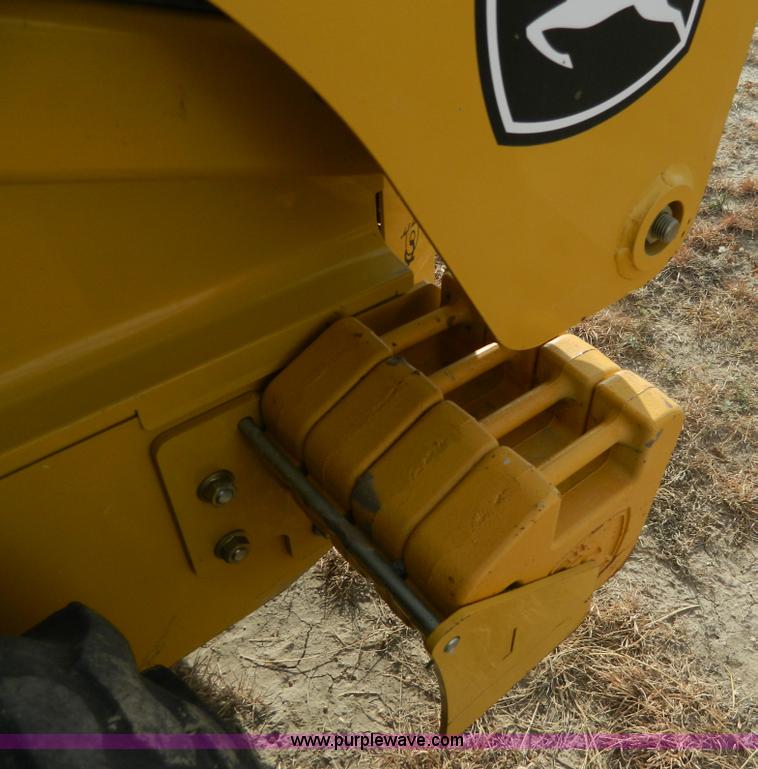 image for item G7666 2009 John Deere 320 skid steer