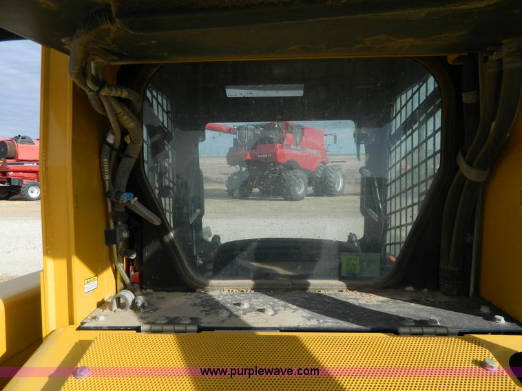 image for item G7666 2009 John Deere 320 skid steer