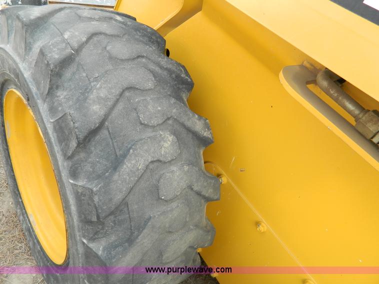 image for item G7666 2009 John Deere 320 skid steer