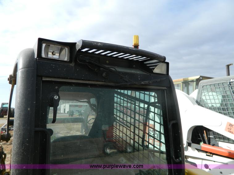 image for item G7666 2009 John Deere 320 skid steer