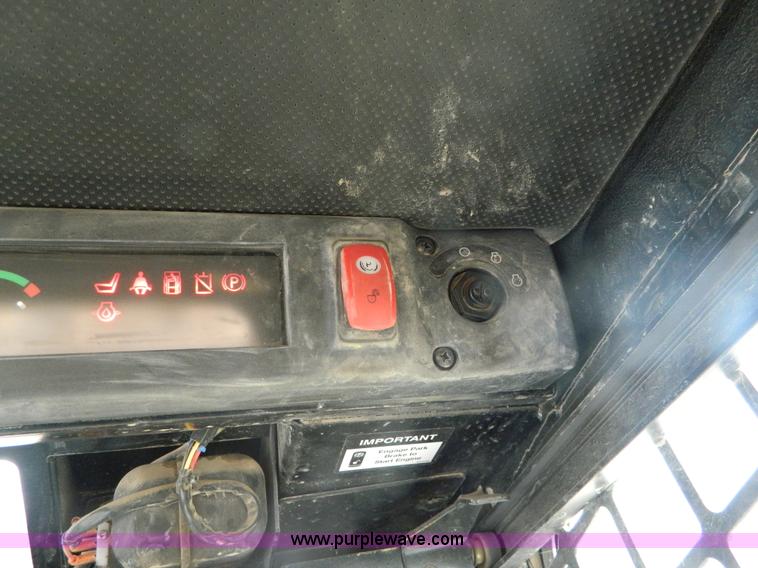 image for item G7666 2009 John Deere 320 skid steer