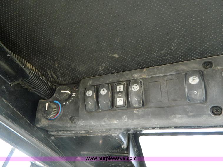 image for item G7666 2009 John Deere 320 skid steer