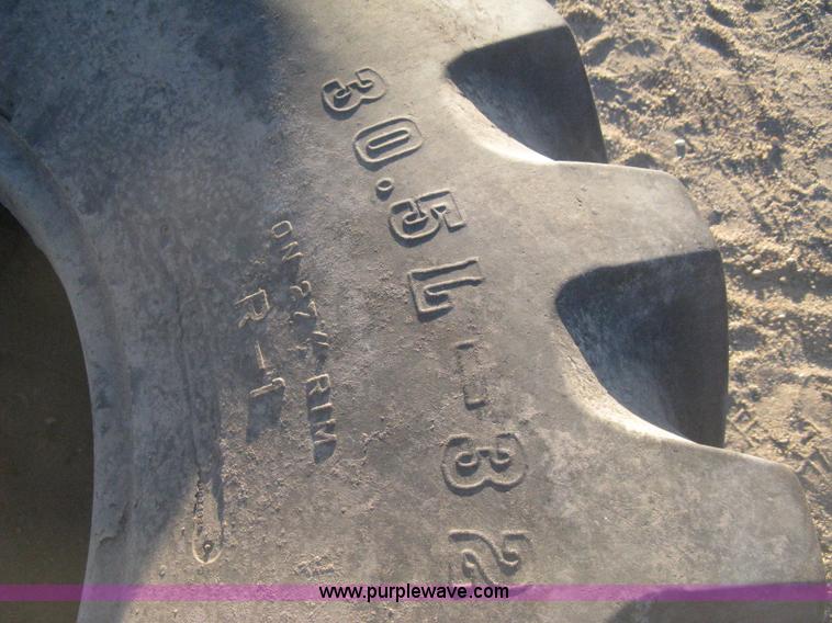 image for item M9159 Firestone Super All Traction 23 tire casing