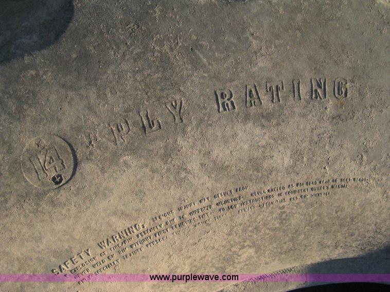 image for item M9159 Firestone Super All Traction 23 tire casing