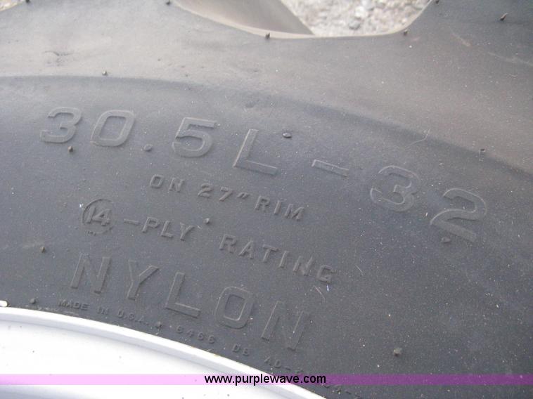 image for item M9163 (2) Firestone Champion Spade Grip 30.5L-32 tires