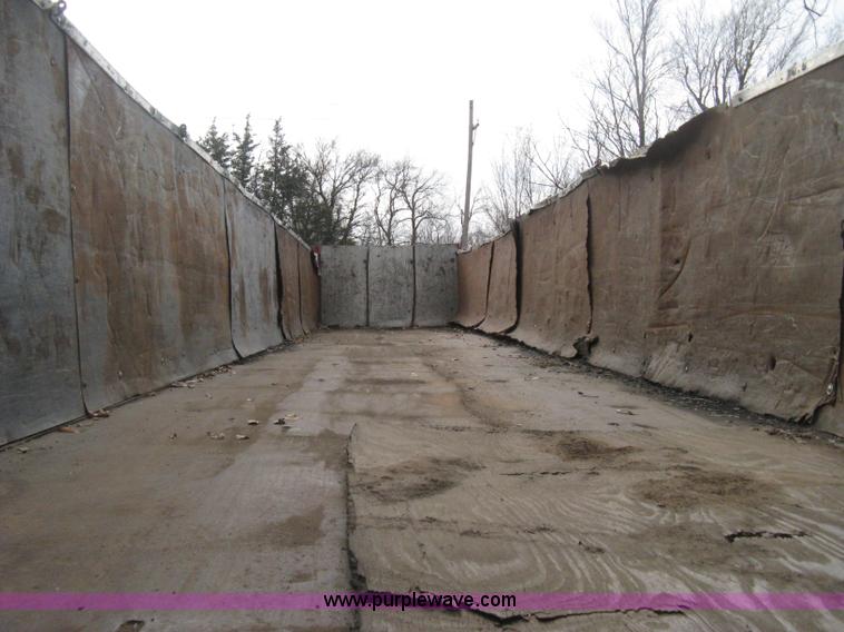 image for item B8346 1969 Fruehauf tandem axle flatbed trailer