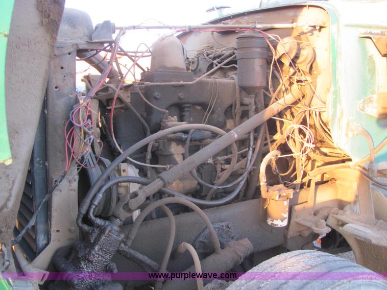 image for item E2790 1974 White Star Western 4864-2 tandem axle roll back truck