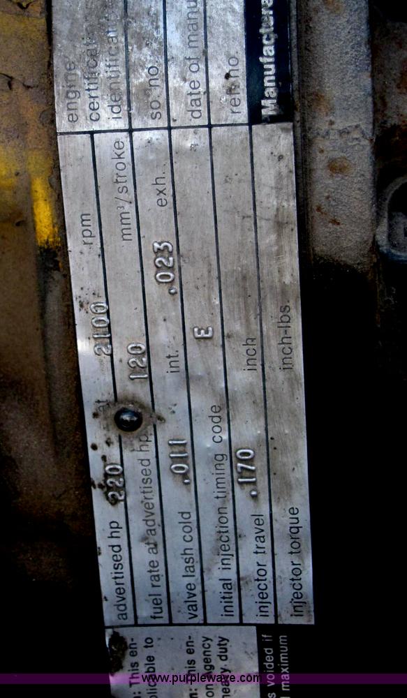 image for item E2790 1974 White Star Western 4864-2 tandem axle roll back truck