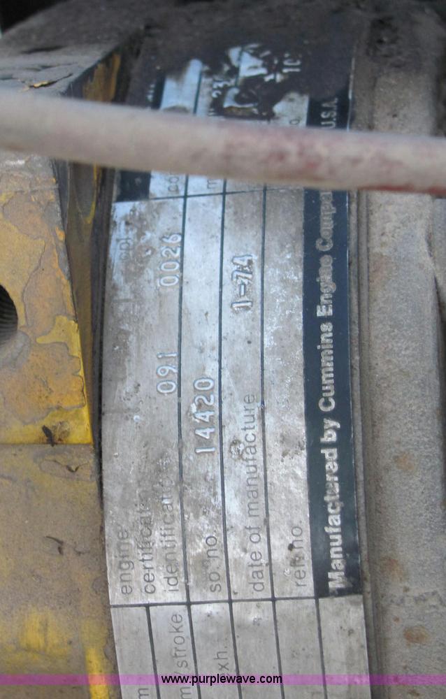 image for item E2790 1974 White Star Western 4864-2 tandem axle roll back truck