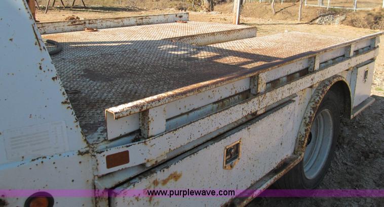 image for item F3086 2004 Ford F4D truck