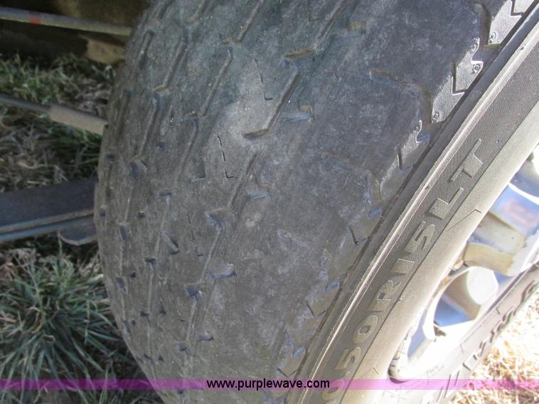 image for item F4121 2002 Nissan Frontier XE Crew Cab pickup truck