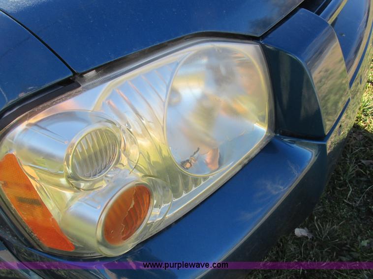 image for item F4121 2002 Nissan Frontier XE Crew Cab pickup truck