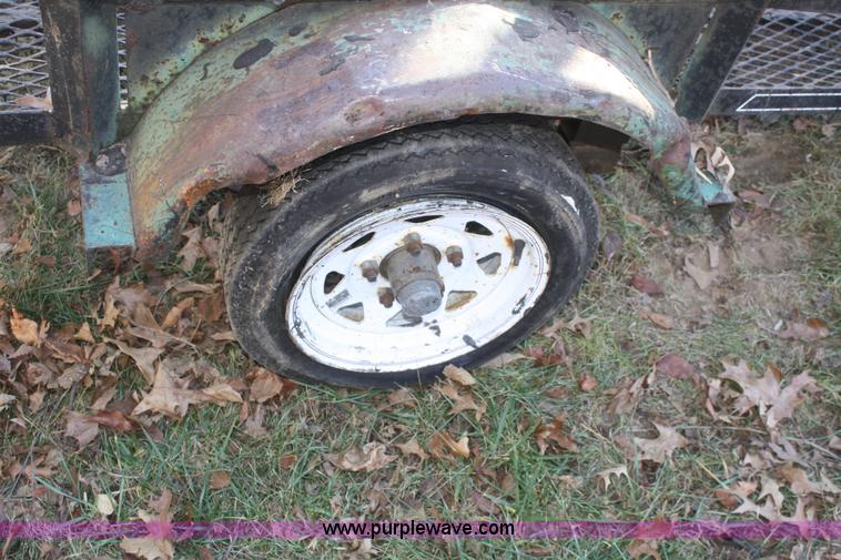 image for item O9873 Single axle tilt deck trailer