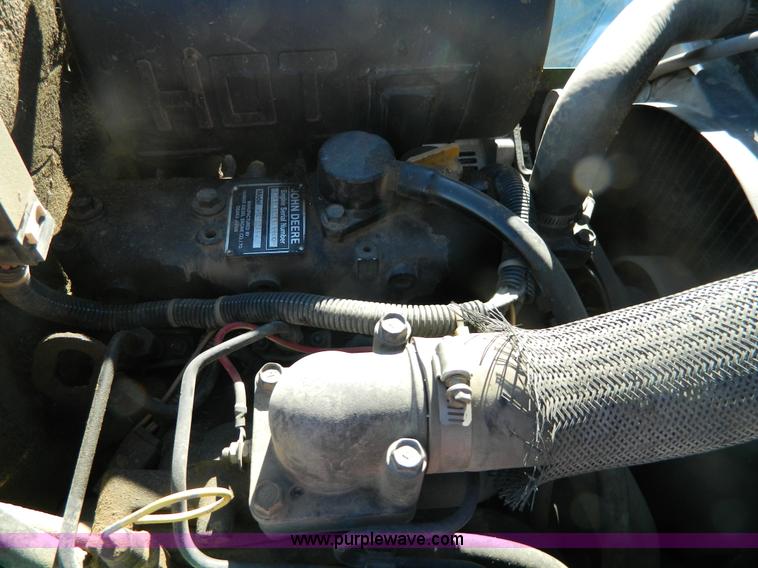 image for item Y9179 1994 John Deere 855 MFWD utility tractor